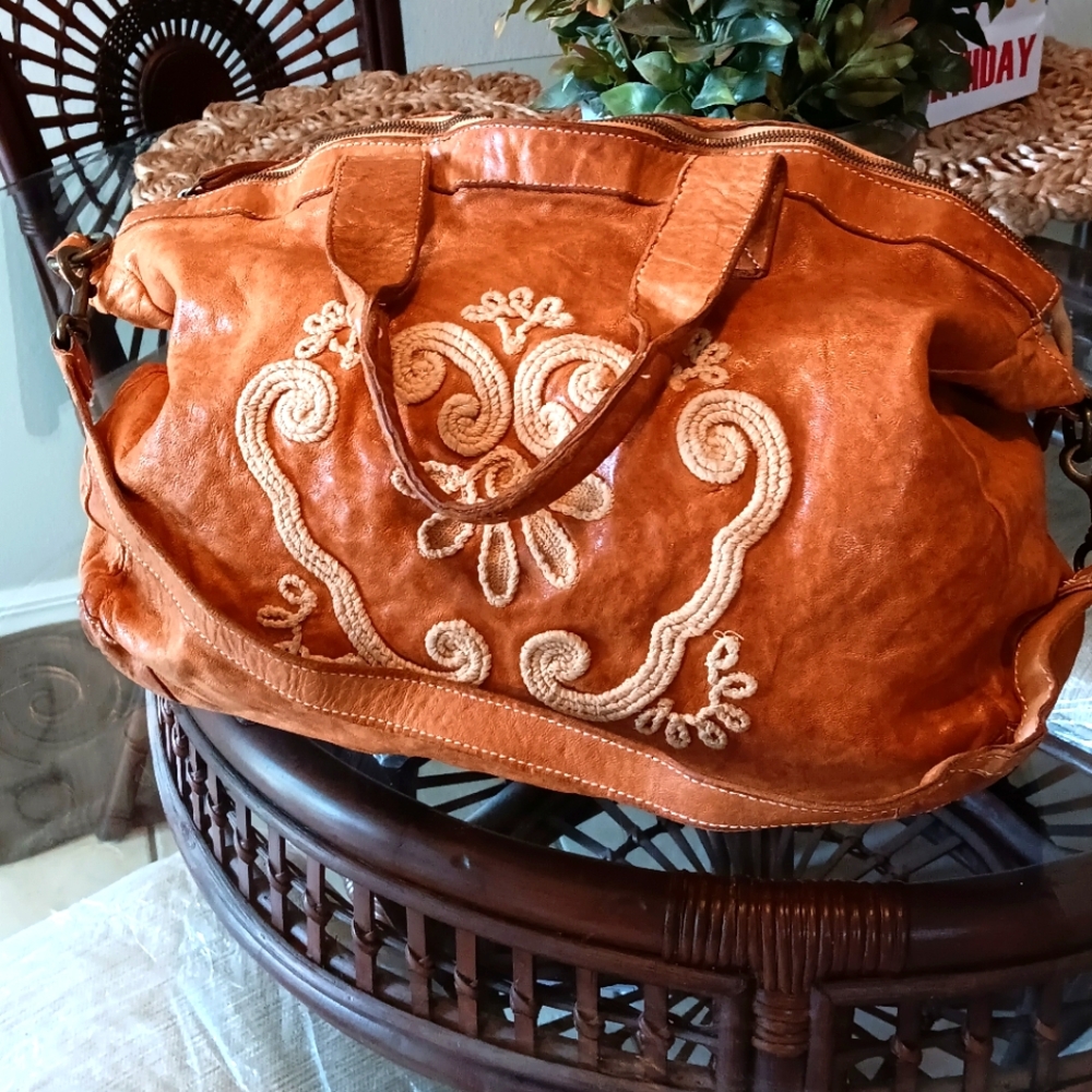 Beautiful rare hard to find genuine leather handbag comfy and roomy and definite